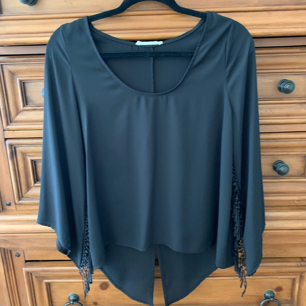 top with wings. fantastic top fun and airy